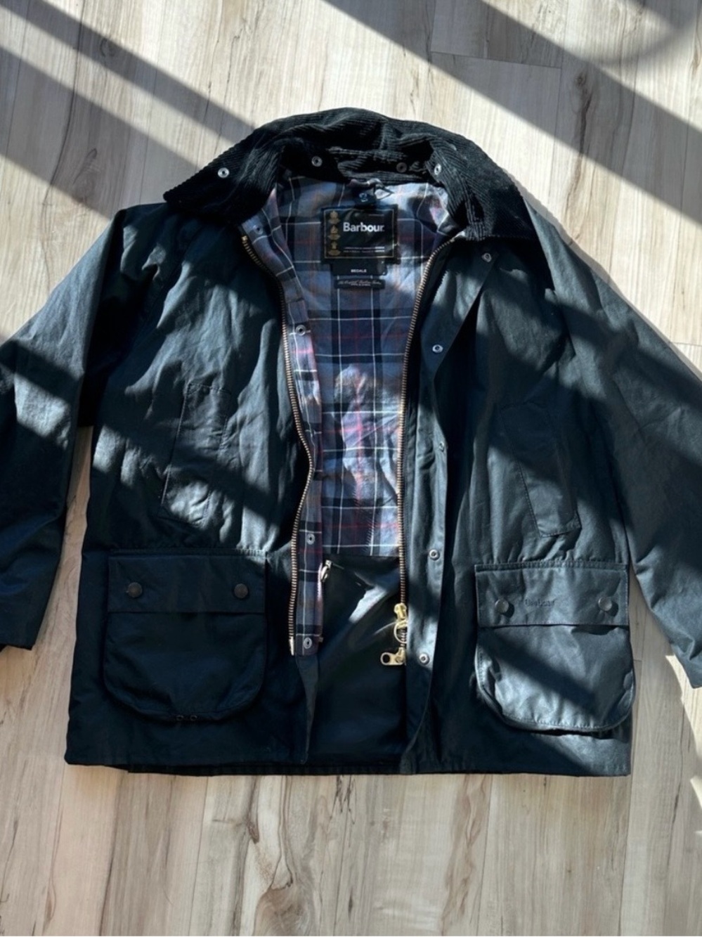 Barbour Black Waxed Cotton Raincoat with Tartan Lining